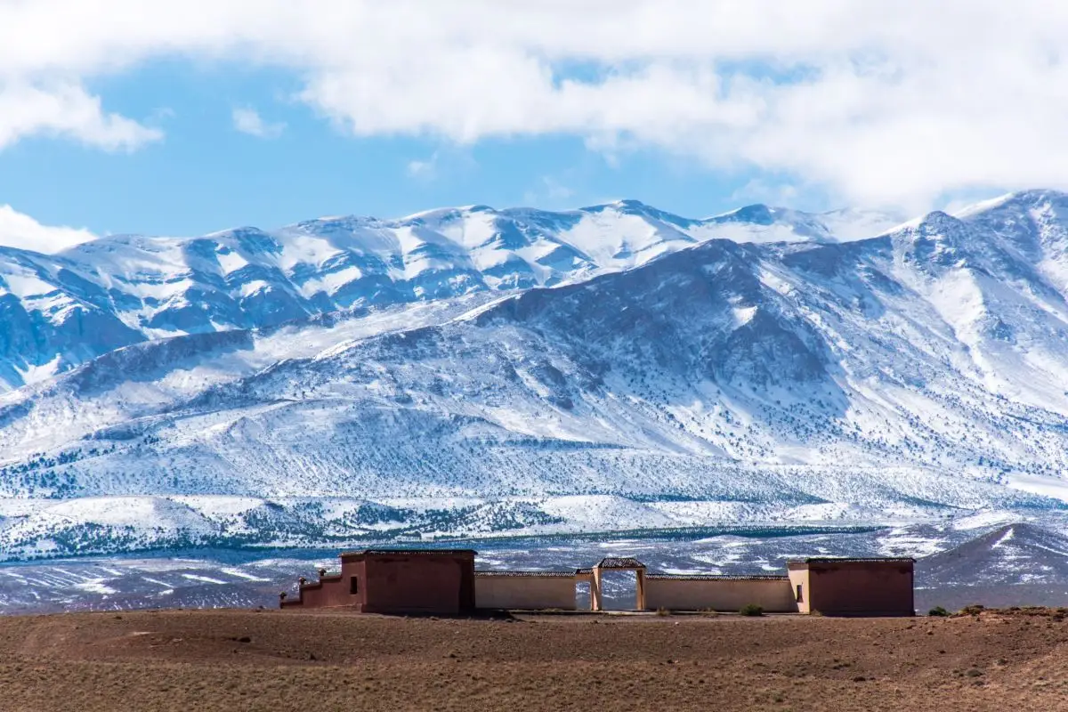 Snow-covered Atlas Mountains on a Morocco transport route from Marrakech